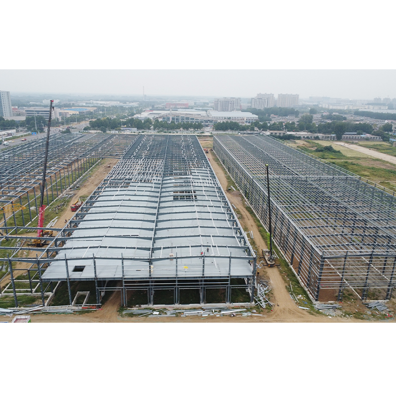 How do customized H-beams support the steel backbone of modern architecture?